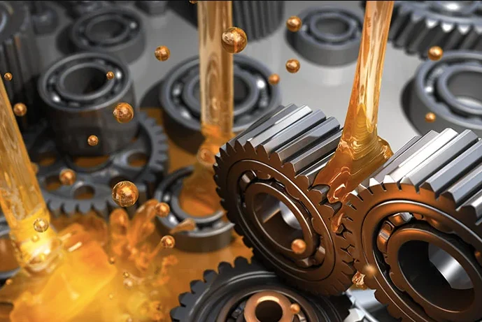 Oil flowing over gears and bearings